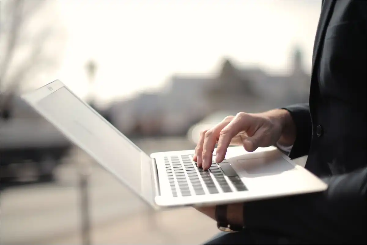 Writer evaluating Techsslaash alternatives on a laptop screen in 2026